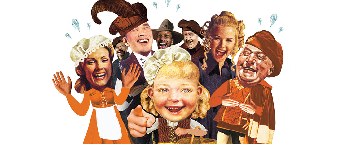 a young girl pointing forward with a group of people laughing behind her