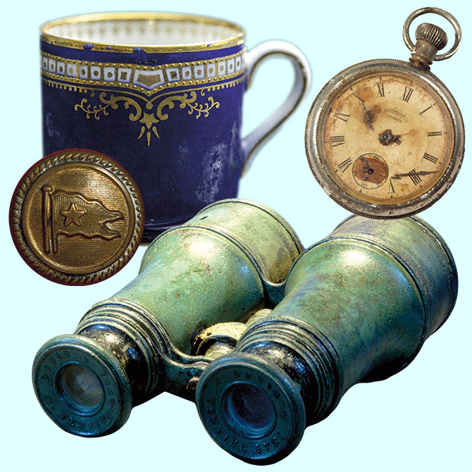 enlargeable image of a cup button binoculars and a pocket watch retrieved from the titanic