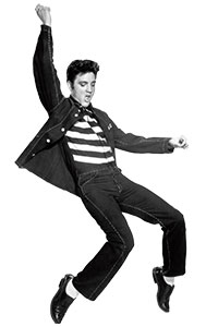 Black & white photo of Elvis performing one of his signature dance moves