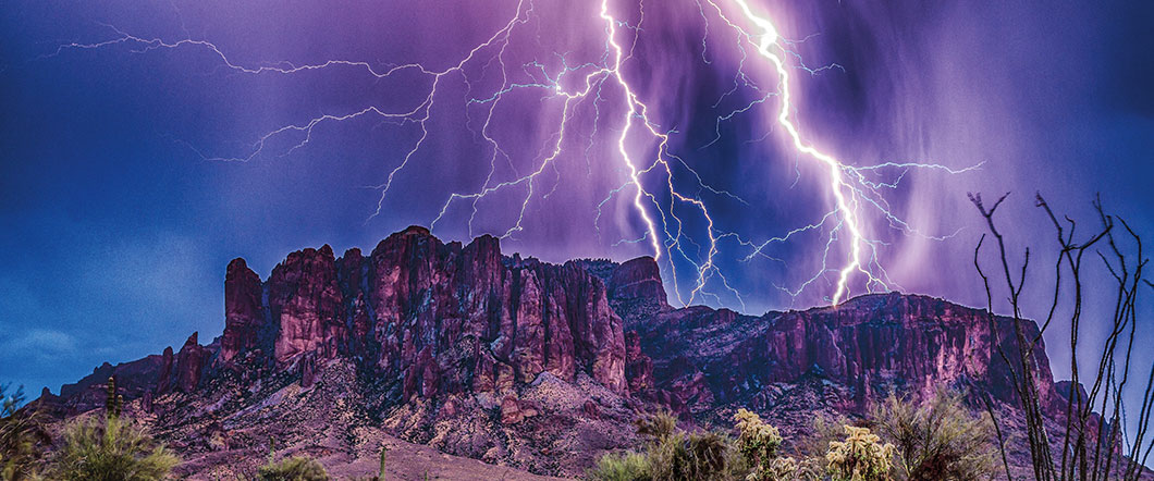Mountains with lightning striking