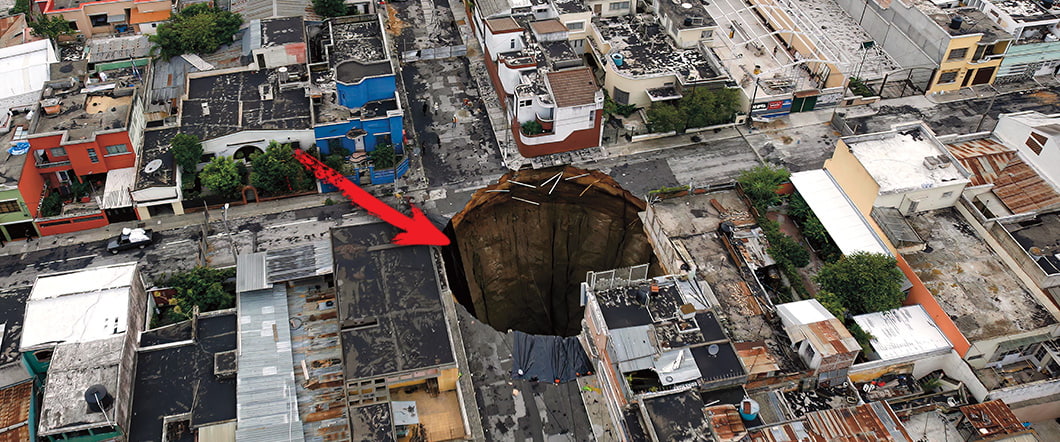 Image of a giant hole in a city